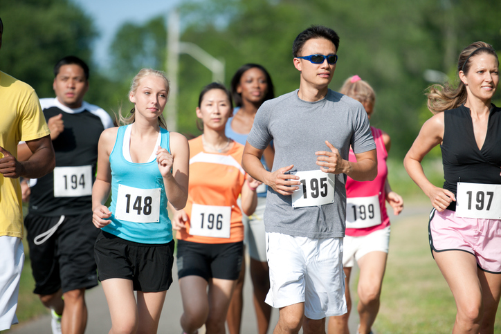 A group of runners in a cross country race.