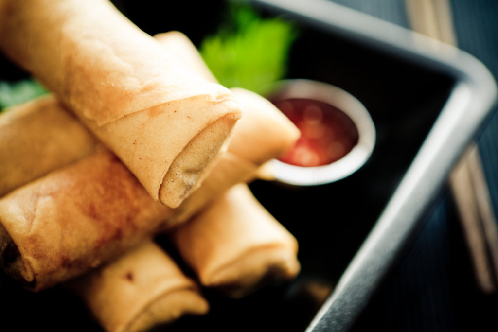 Spring rolls served with sauce